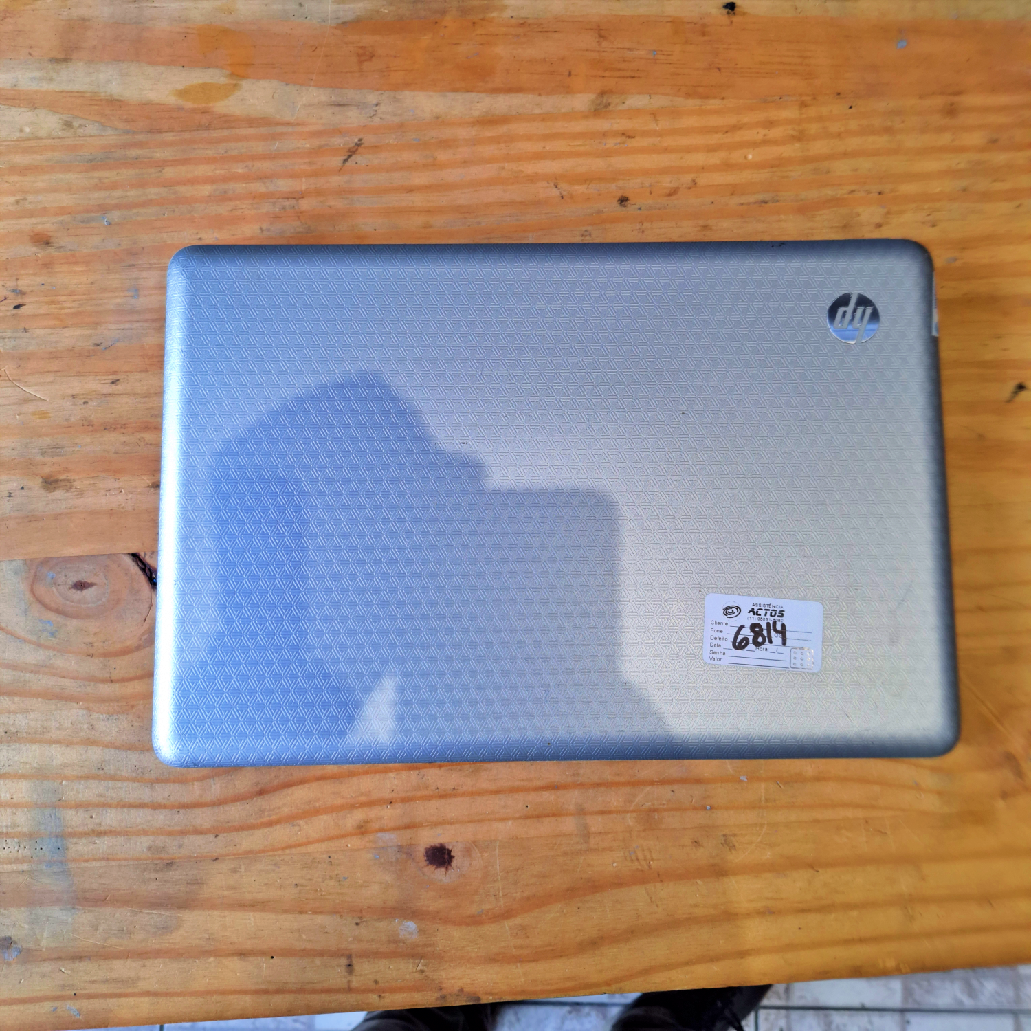 Notebook HP G42-440br ligado exibindo área de trabalho após a substituição expressa do teclado em SP